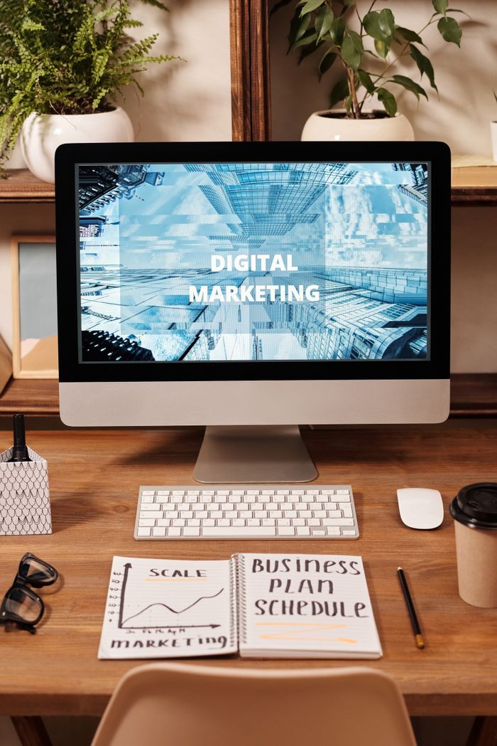 Services Contemporary office setup featuring digital marketing strategy on a computer screen, ideal for business technology themes.